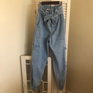 TGLA lighter wash denim jogger-type pants with paper-bag stretch waist